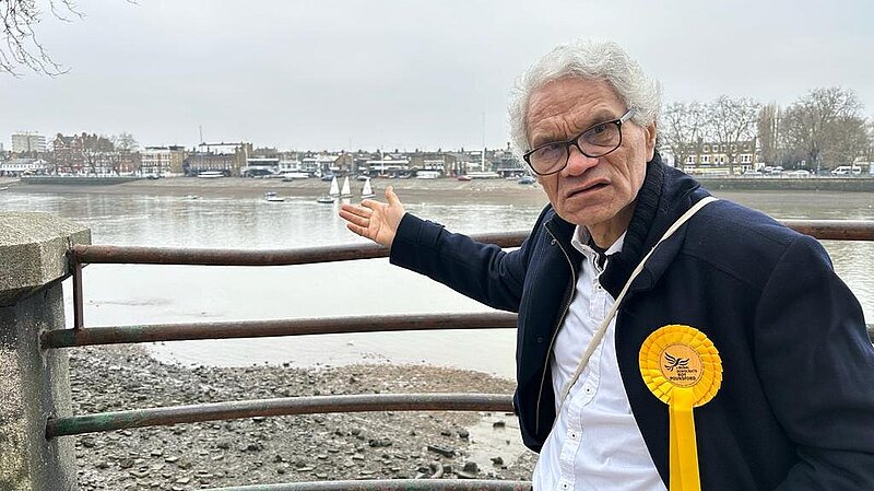 Fulham Liberal Democrat Roy Pounsford points at the River Thames